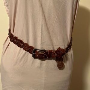 Brown leather belt circle sections 40” long plus silver tone buckle